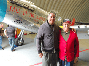 Craig Huntly and original Tuskegee Airman George Hardy with his aircraft from World War II