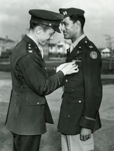 Parrish awarding Tuskegee Airmen Capt. Harold Sawyer the Distinguished Flying Cross. 