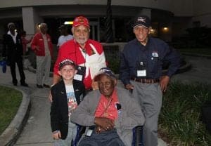 Quinn Thorne with original Tuskegee Airmen (from top left) Leo Gray, Dr. Roscoe Brown and the late Calvin Spann.