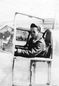 Sgt Clarence Huntly in the cockpit of a P-51