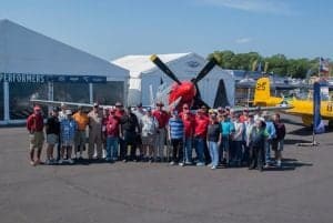 Veterans photo in front of Red Nose Mustang at Sun 'n Fun 2016