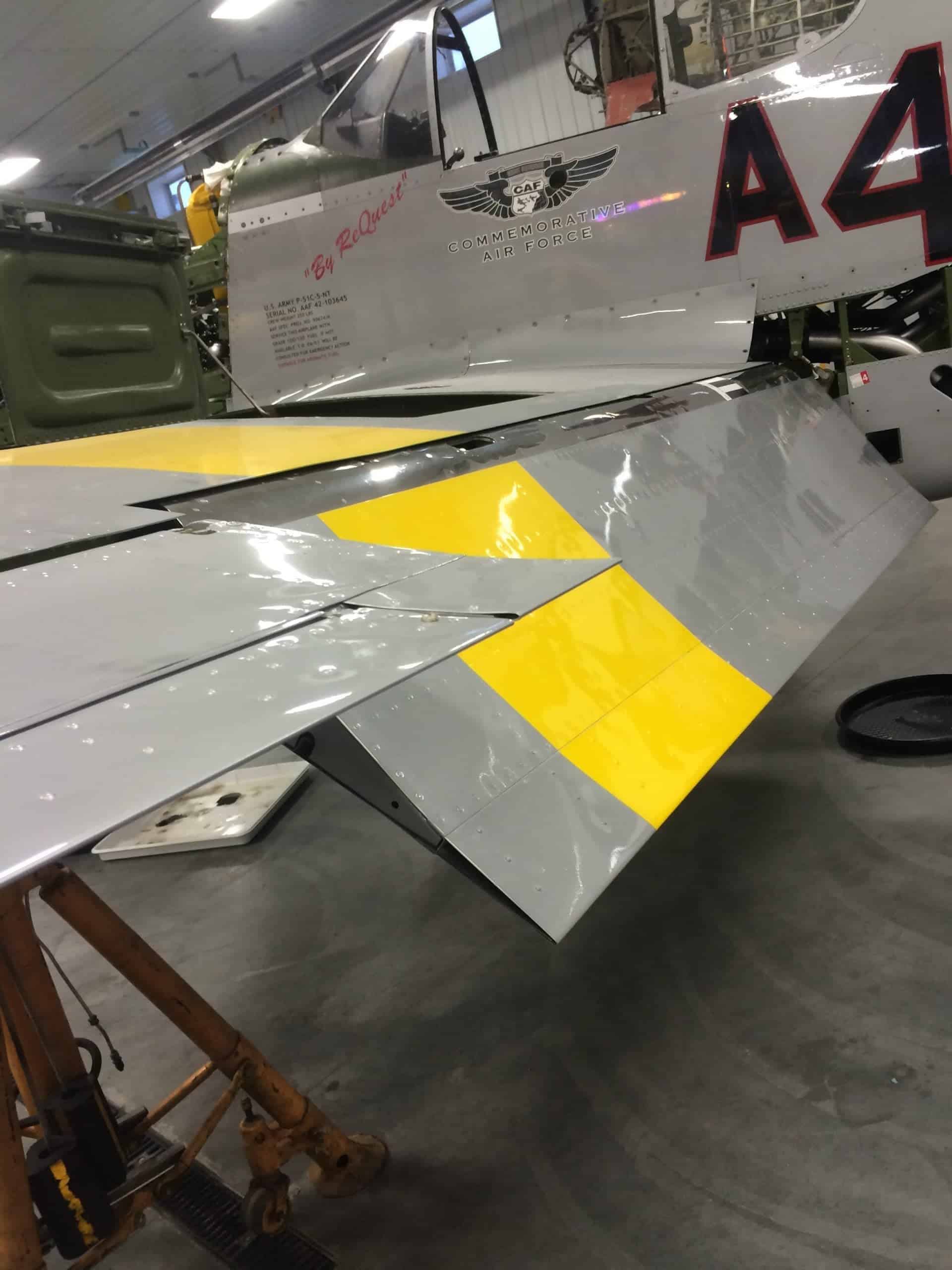 Flap re-installed after aileron cable replacement.
