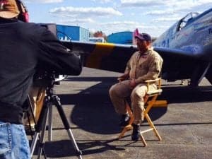 P-51C Mustang Pilot Bill Shepard prepared for an on-camera interview with a local TV station.