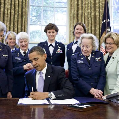 President Barack Obama signs S.614 in the Oval Office July 1 at the White House. The bill awards a Congressional Gold Medal to Women Airforce Service Pilots. The WASP program was established during World War II, and from 1942 to 1943, more than 1,000 women joined, flying 60 million miles of noncombat military missions. Of the women who received their wings as Women Airforce Service Pilots, approximately 300 are living today. (Official White House photo/Pete Souza)